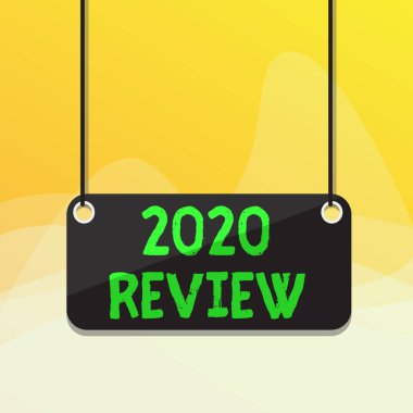 2020 Review 'ı gösteren bir not yazıyorum. 2020 Yönetim Kurulu renk arkaplan tahtası eklenmiş yeni eğilimler ve turizm veya hizmetlerde beklentiler gösteren iş fotoğrafı.