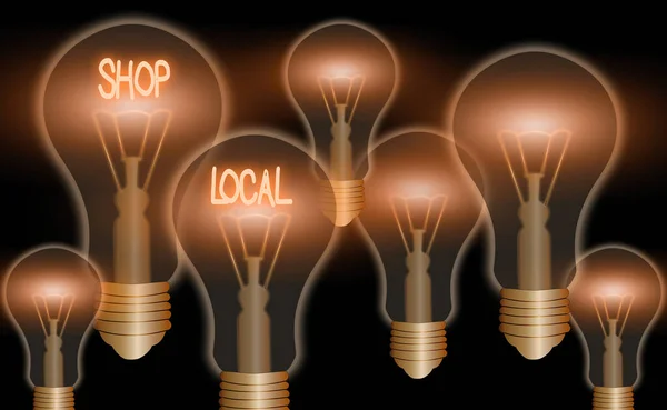 Text sign showing Shop Local. Conceptual photo a preference to buy locally produced goods and services.