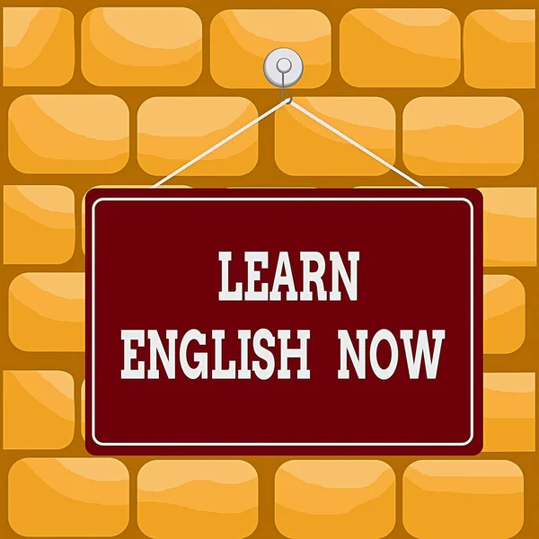 Handwriting text writing Learn English Now. Concept meaning gain or acquire knowledge and skill of english language Colored memo reminder empty board blank space attach background rectangle.
