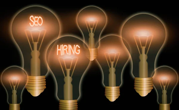 Text sign showing Seo Hiring. Conceptual photo employing a specialist will develop content to include keywords. — Stockfoto