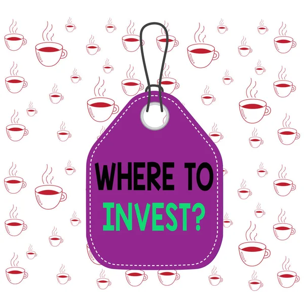 Writing note showing Where To Invest question. Business photo showcasing asking about actions or process of making more money Empty tag colorful background label rectangle attach string.