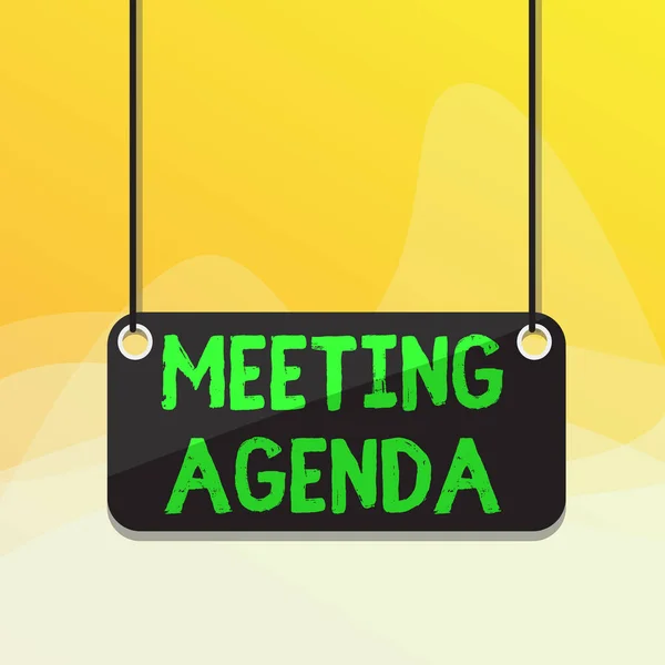 Writing note showing Meeting Agenda. Business photo showcasing items that participants hope to accomplish at a meeting Board color background plank attached string panel rectangle.