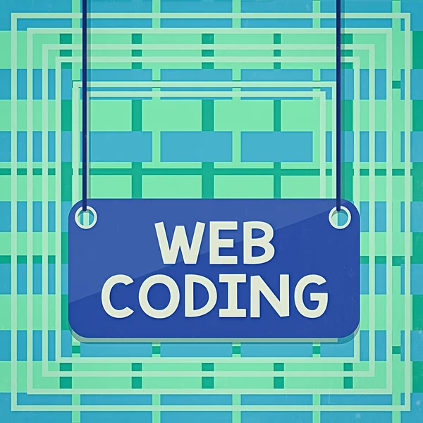 Text sign showing Web Coding. Conceptual photo work involved in developing a web site for the Internet Board color background plank attached string panel rectangle empty surface.