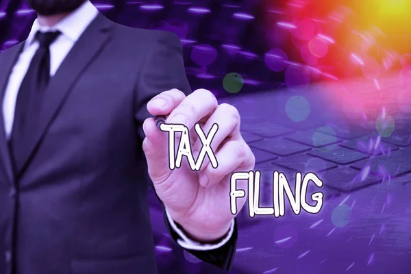 Word writing text Tax Filing. Business concept for Submitting documens filed with tax payer financial information.