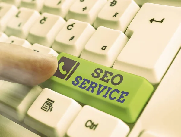 Píšu text Seo Service. Obchodní koncepce pro techniky a postupy pro zvýšení viditelnosti webových stránek. — Stock fotografie