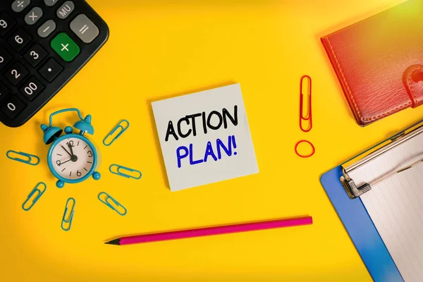 Text sign showing Action Plan. Conceptual photo proposed strategy or course of actions for certain time Alarm clipboard calculator wallet clip band pencil notepad color background.