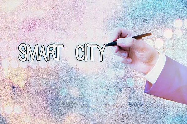 Conceptual hand writing showing Smart City. Business photo text urban area that uses different electronic Internet of things. — Stockfoto