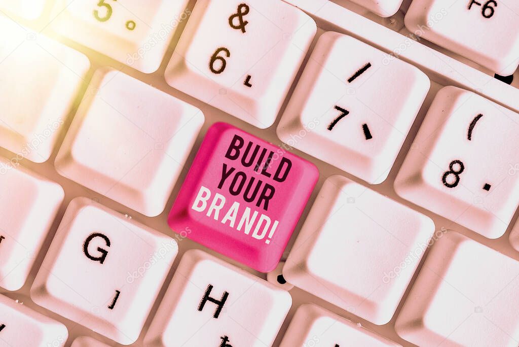 Writing note showing Build Your Brand. Business photo showcasing creates or improves customers knowledge and opinions of product.