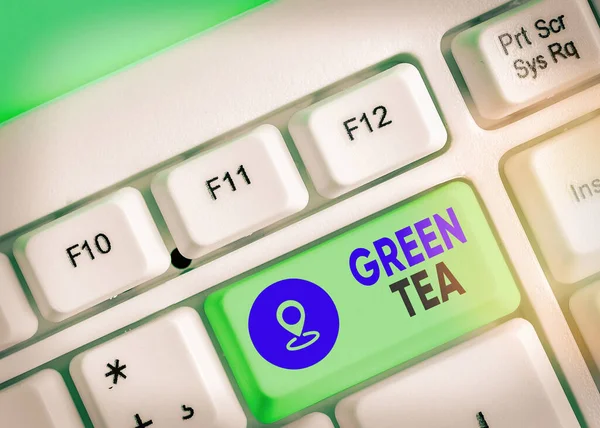 Signo de texto que muestra té verde. Tipo de foto conceptual del té que se hace de hojas y brotes de Camellia sinensis . — Foto de Stock