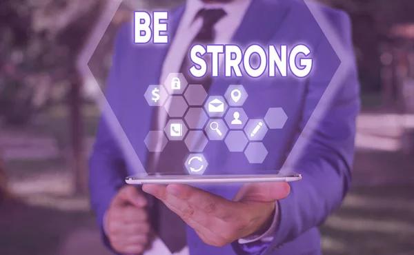 Text sign showing Be Strong. Conceptual photo able to withstand great circumstances or pressure in life.