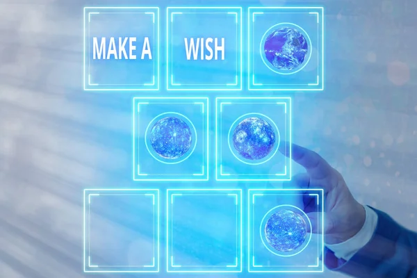 Skriva lapp som visar Make A Wish. Affärsfoto visa upp att önska en situation som skiljer sig från den som finns element av denna bild som tillhandahålls av NASA. — Stockfoto