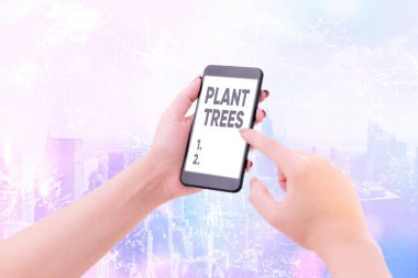 Kelime yazma metni Bitki Ağaçları. Arazi ekimi ve ormancılık için ağaç dikme süreci için iş kavramı.