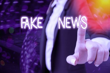 Sahte haber metni yazmak. Bunun medya tarafından doğru olmadığını göstermek için bilgi verme konsepti.