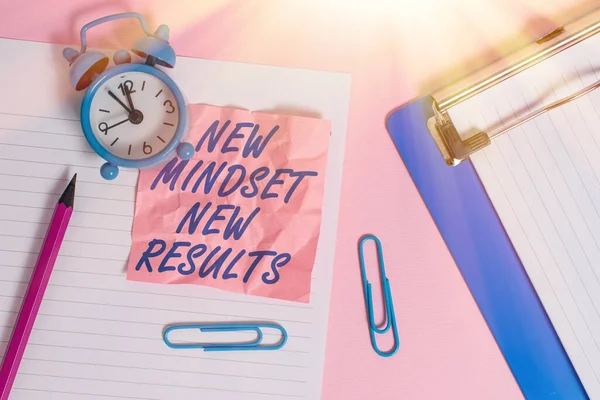 Text sign showing New Mindset New Results. Conceptual photo obstacles are opportunities to reach achievement Paper sheet note clipboard pencil clips alarm clock colored background. — Stock Photo, Image