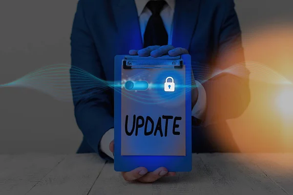 Word writing text update. Präsentation von Geschäftsfotos durch Hinzufügen neuer Informationen oder aktueller Korrekturen — Stockbild Word writing text update. Geschäftskonzept durch Hinzufügen neuer Informationen oder aktualisierte Korrekturen. — Stockfoto