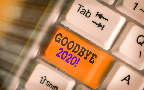 Conceptual hand writing showing Good Bye 2020. Business photo showcasing express good wishes when parting or at the end of last year.