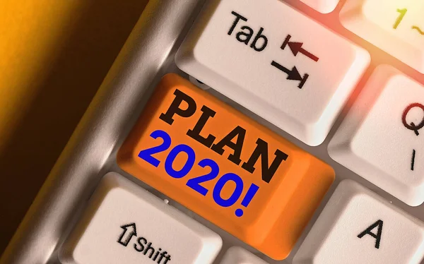 Písemné koncepční psaní ukazující plán 2020. Firemní fotografie podrobný návrh k dosažení něčeho příštího roku. — Stock fotografie