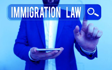 Göçmenlik Yasası 'nı gösteren bir yazı. Kavramsal fotoğraf ulusal tüzüğü ve göçle ilgili hukuki emsaller.