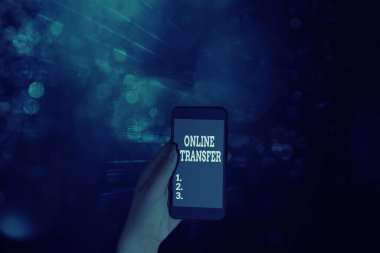 Word writing text Online Transfer. Business concept for authorizes a fund transfer over an electronic funds transfer.