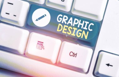 Grafik Tasarımı 'nı gösteren not yazılıyor. Reklamlarda metin ve resimleri birleştirme sanatını gösteren iş fotoğrafı.