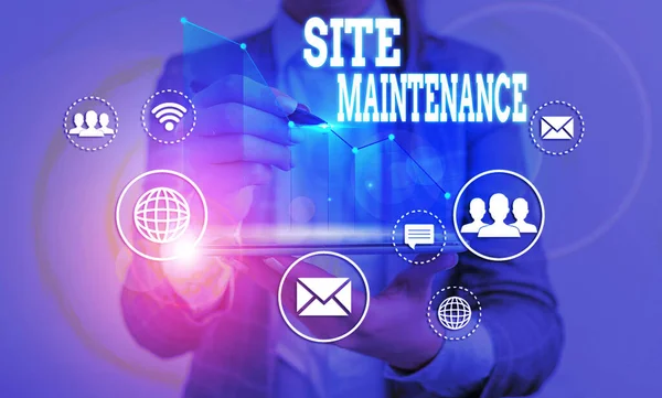 Word writing text Site Maintenance. Business concept for keeping the website secure updated running and bugfree.