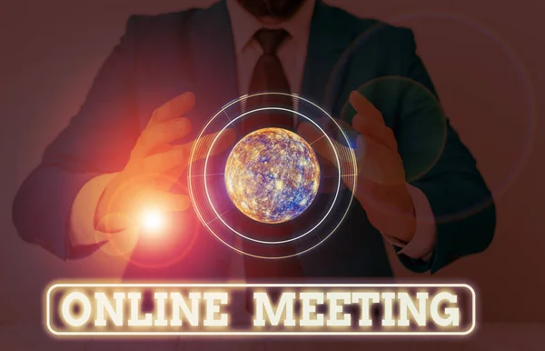 Conceptual hand writing showing Online Meeting. Business photo text a meeting that takes place over an electronic medium Elements of this image furnished by NASA.