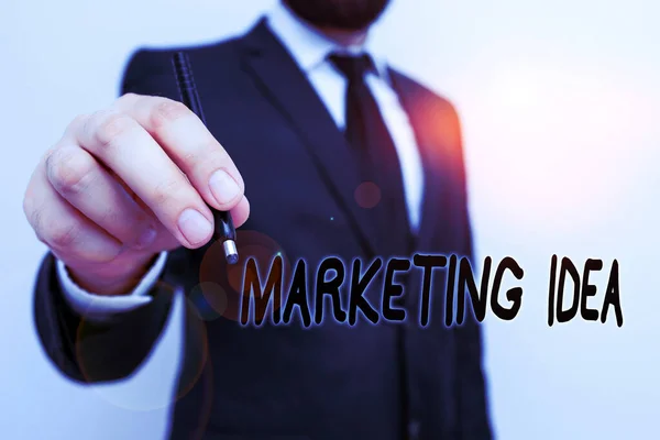 Escritura manual conceptual que muestra la idea de marketing. Foto de negocios mostrando actividades que buscan ganar cuota de mercado para un concepto Hombre humano con barba desgaste formal traje de trabajo ropa mano . — Foto de Stock