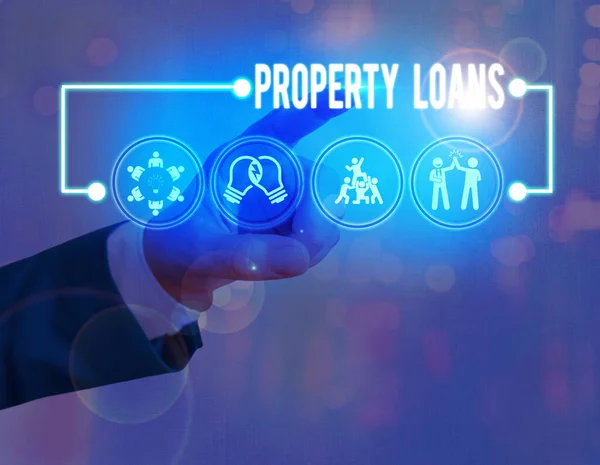 Textzeichen mit Immobilienkrediten. Konzeptfoto eines Darlehens, das zum Kauf von Land oder Gebäuden und Infrastrukturen verwendet wird. — Stockfoto