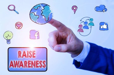 Conceptual hand writing showing Raise Awareness. Business photo showcasing creating a specific messaging campaign about an issue.