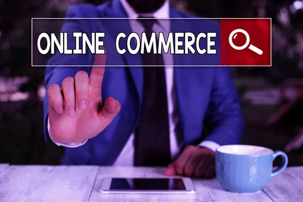 Writing note showing Online Commerce. Business photo showcasing activity of buying or selling of products on online services. — Stockfoto