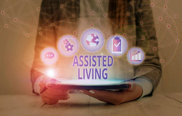 Text sign showing Assisted Living. Conceptual photo longterm care facility for elderly or disabled showing.
