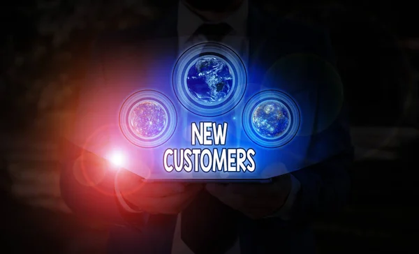 Text sign showing New Customers. Conceptual photo an entity that has not previously purchased one goods Elements of this image furnished by NASA. — Stockfoto