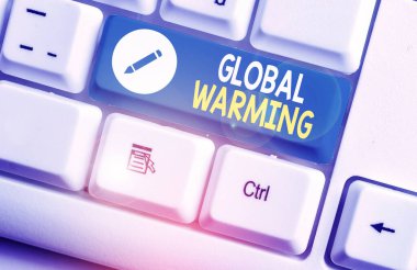 Küresel ısınmayı gösteren bir not yazıyorum. Dünya sıcaklığındaki kademeli artışı gösteren iş fotoğrafı atmosferdir..