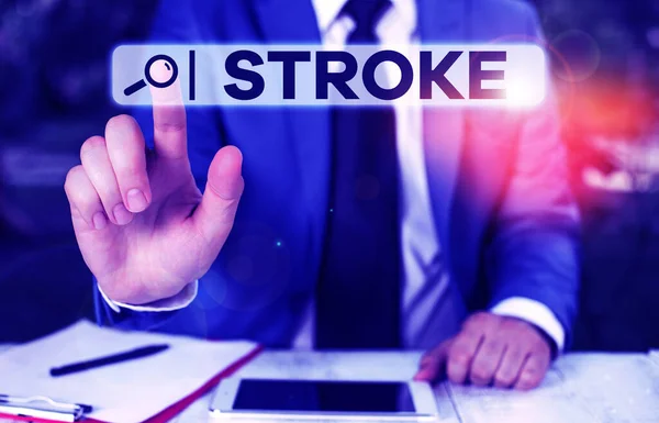 Χειρόγραφο κείμενο Stroke. Έννοια σημαίνει ασθενείς που χάνουν τις αισθήσεις τους λόγω της κακής ροής του αίματος ιατρική Επιχειρηματίας με το δάχτυλο μπροστά του. — Φωτογραφία Αρχείου