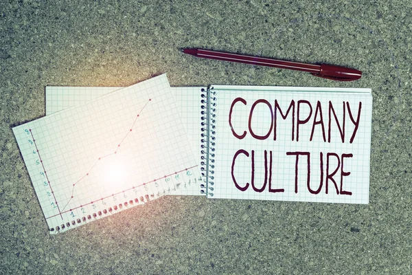 Conceptual hand writing showing Company Culture. Business photo showcasing pervasive values and attitudes that characterize a company Desk notebook paper office paperboard study supplies chart.