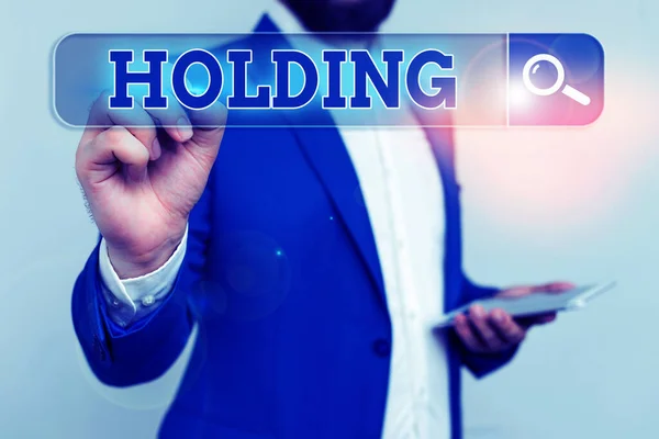 Konceptualny rękopis pokazujący Holding. Biznes zdjęcie pokazujące nieruchomości akcji i innych aktywów finansowych w czyimś posiadaniu. — Zdjęcie stockowe