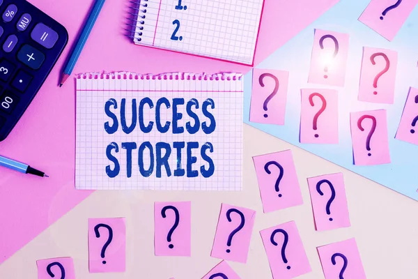 Text sign showing Success Stories. Conceptual photo story of something or someone that achieves great success Mathematics stuff and writing equipment above pastel colours background.