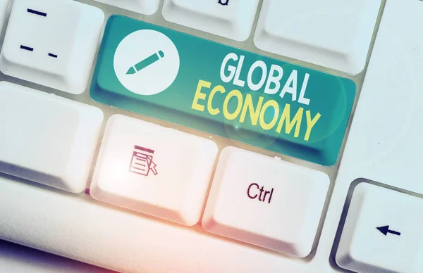 Writing note showing Global Economy. Business photo showcasing Worldwide economic activity between various countries. — Stock Photo, Image