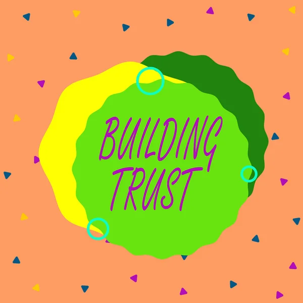 Handwriting text Building Trust. Concept meaning activity of emerging trust between showing to work effectively Asymmetrical uneven shaped format pattern object outline multicolour design.