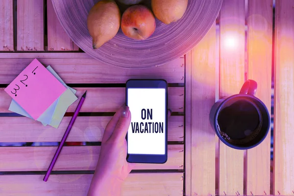 Word writing text On Vacation. Business concept for period spent away from home or business in travel or recreation. — Stockfoto