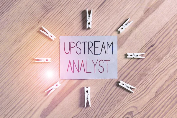 Handwriting text Upstream Analyst. Concept meaning advocacy strategies in support of environmental issues Colored clothespin papers empty reminder wooden floor background office. — Stock Photo, Image