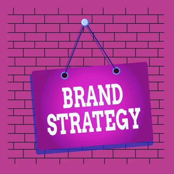 Text sign showing Brand Strategy. Conceptual photo Longterm plan for the development of a successful brand Colored memo reminder empty board blank space attach background rectangle.