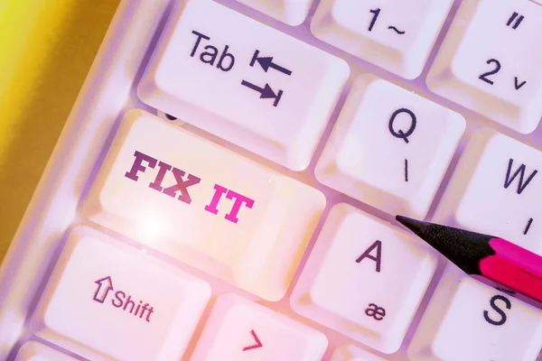 Handwriting text Fix It. Concept meaning Fasten something securely in a particular place or position To repair.