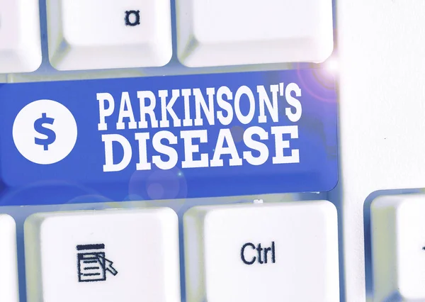 Escrever uma nota a mostrar que Parkinson é doença. Foto de negócios mostrando distúrbio do sistema nervoso que afeta o movimento . — Fotografia de Stock