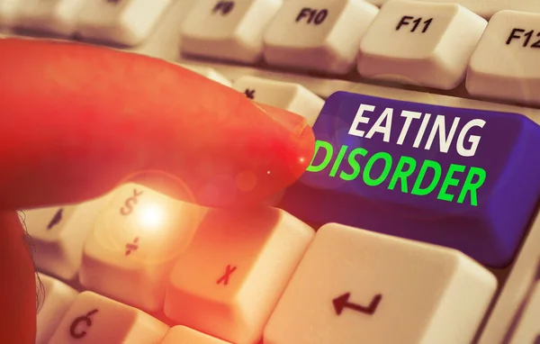 Writing note showing Eating Disorder. Business photo showcasing illnesses that are characterized by irregular eating habits. — Stock Photo, Image