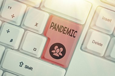 Salgını gösteren bir not yazıyorum. İş fotoğraflarının geniş bir alana yayılması nüfusun yüksek oranını etkiliyor.