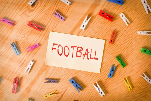 テキストサッカーの手書き。コンセプトボールを蹴ることを含むチームゲームの様々な形態のいずれかを意味します。. — ストック写真