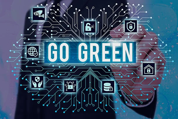 Γράφοντας κείμενο λέξη Go Green. Επιχειρηματική ιδέα για περισσότερες φιλικές αποφάσεις ως μείωση της ανακύκλωσης. — Φωτογραφία Αρχείου