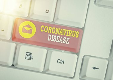 Kelime yazma Coronavirus Hastalığı. Yeni bir virüs olan SARSCoV2 'nin yol açtığı hastalık olarak tanımlanan iş konsepti.