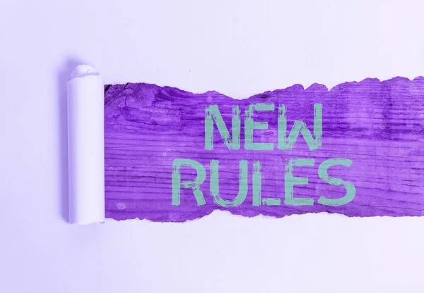 Teks tulisan tangan Aturan Baru. Konsep yang berarti baru-baru ini salah satu dari seperangkat regulasi eksplisit atau dipahami . — Stok Foto